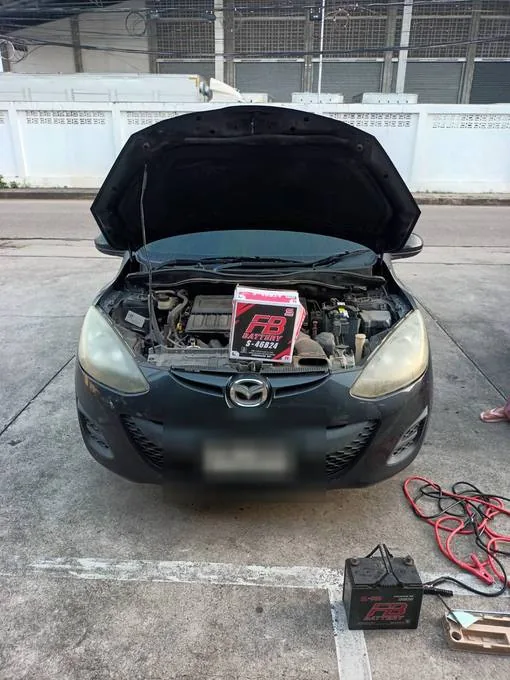 เปลี่ยนแบตเตอรี่ Mazda2 นอกสถานที่